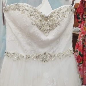 Wedding dress size 8. Paid over $1000 for it. Yours for $300 or best offer.